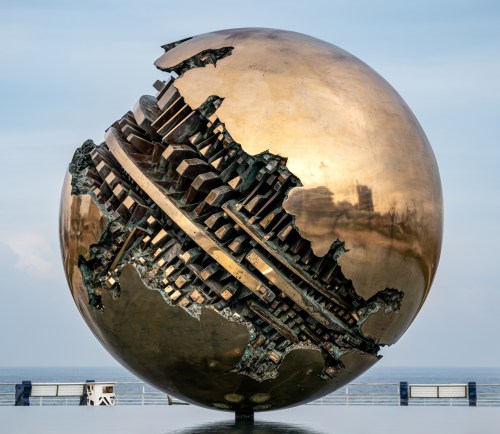 The bronze sculpture "Sfera grande" (Large sphere), depicted here, is a subject out of ordinary, a perfect figure, energy emanating from a form.